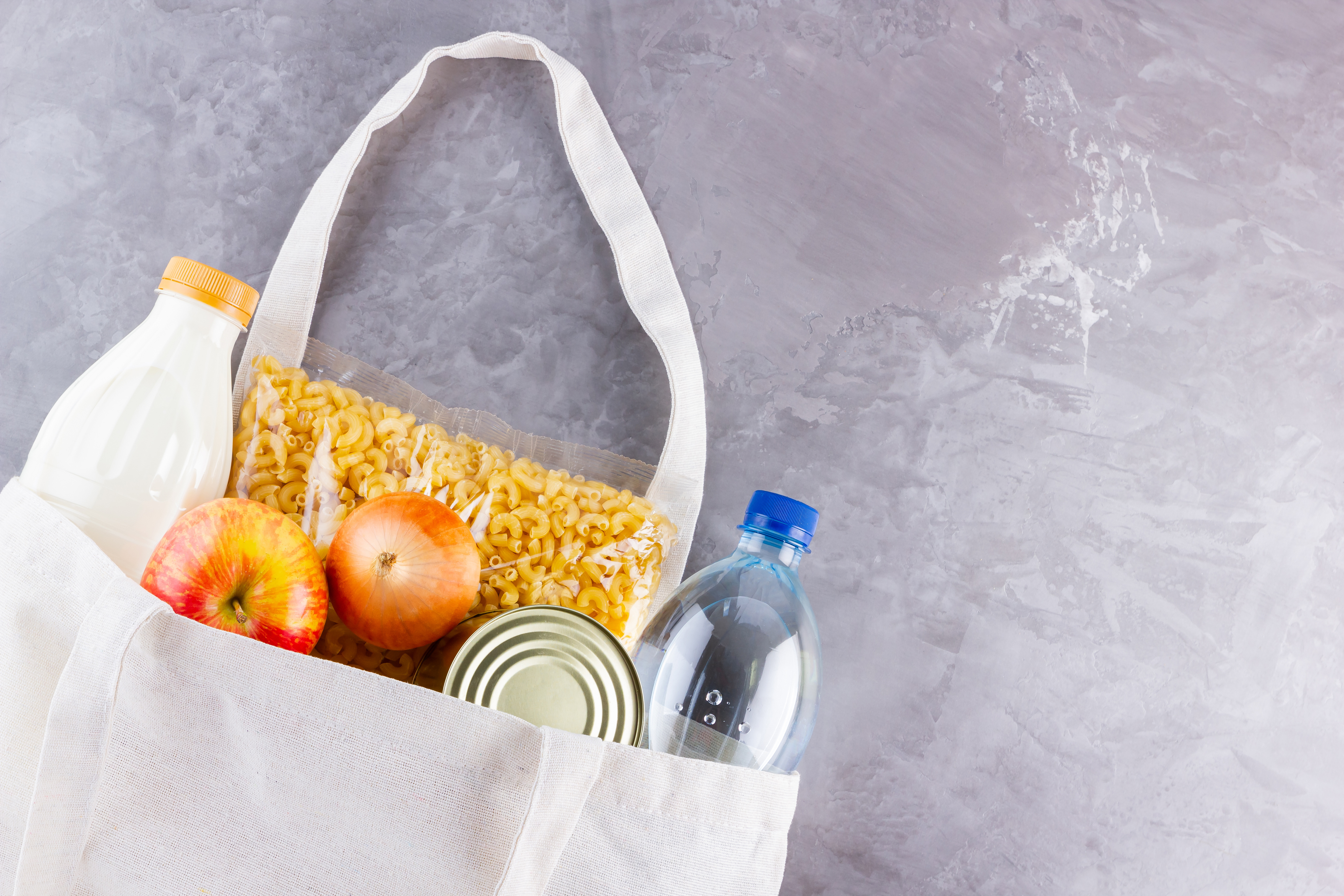 Food donations in linen bag. Food delivery in eco bag. Eco bag w
